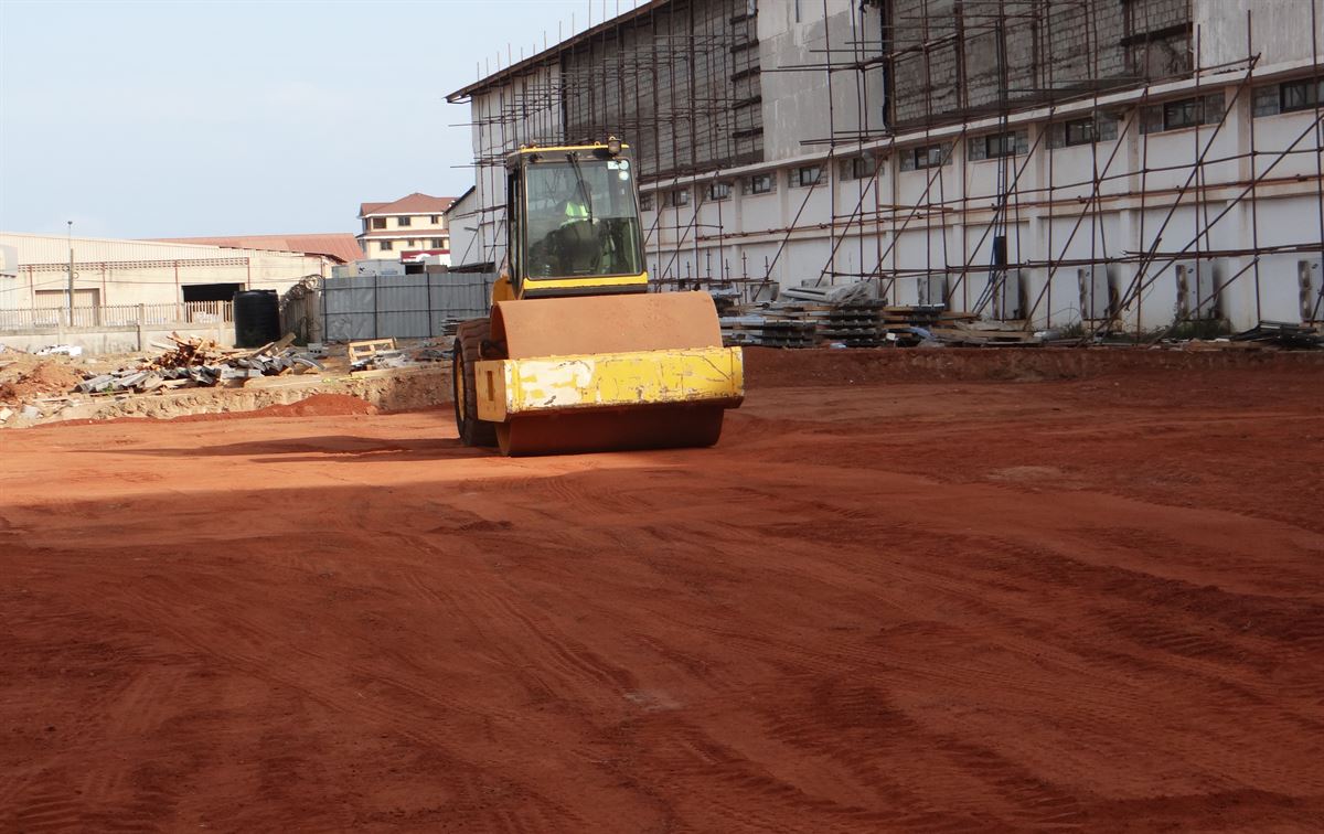 Roller compacting laterite during earthworks on a HAYBEL site