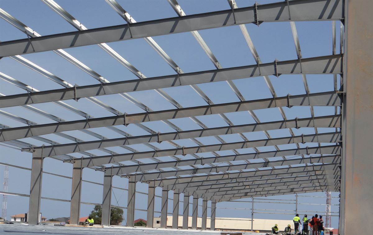 Structural steel roof framing on a large-span building